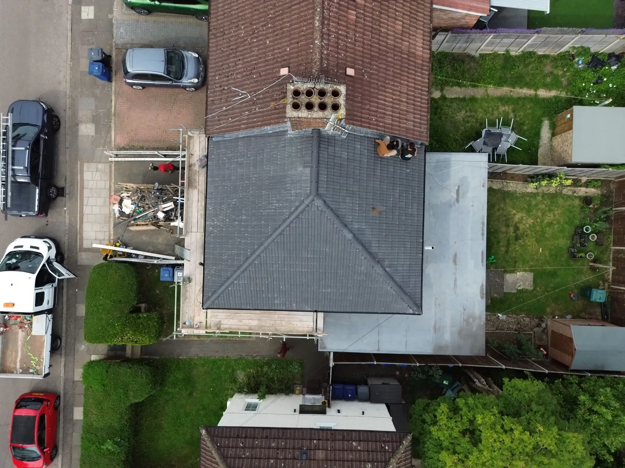Completed roof replacement in Edgware, Greater London, viewed from above, alongside a neighbouring property's roof