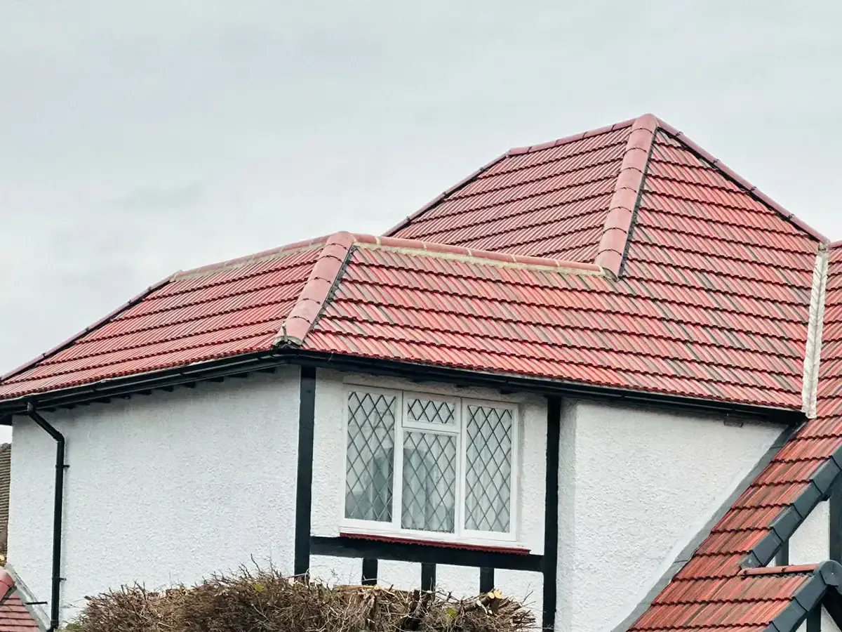 Redland 49 roof tiles in Rustic Red on a client-confirmed new-roof project in Godalming