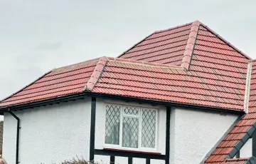Redland 49 roof tiles in Rustic Red on a client-confirmed new-roof project in Godalming